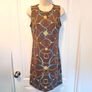 Sleeveless sheath dress in elegant equestrian pattern.